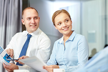 Image showing business people with papers meeting in office