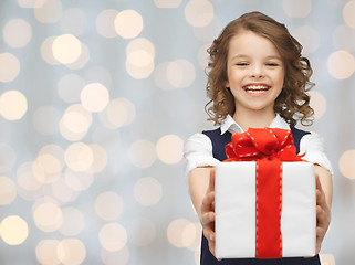 Image showing happy smiling girl with gift box