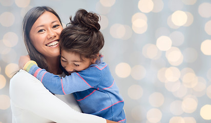 Image showing happy mother and daughter hugging