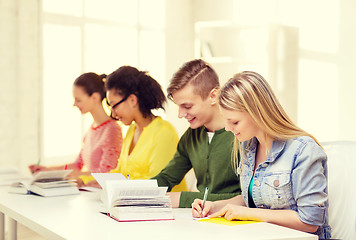 Image showing students with textbooks and books at school