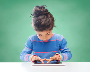 Image showing little girl with tablet pc at school