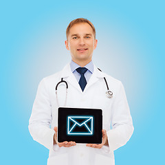 Image showing smiling male doctor with stethoscope and tablet pc