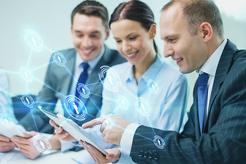 Image showing business team with tablet pc having discussion