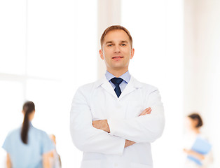 Image showing smiling male doctor in white coat