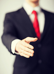 Image showing businessman with open hand