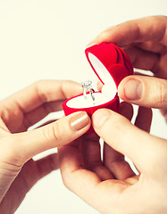 Image showing couple with wedding ring and gift box