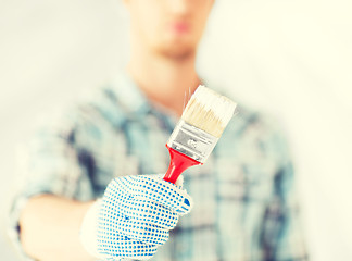 Image showing man hand with paintbrush