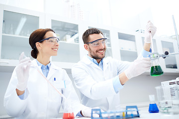 Image showing young scientists making test or research in lab