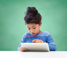 Image showing little girl with tablet pc at school