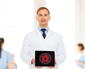 Image showing smiling male doctor with tablet pc