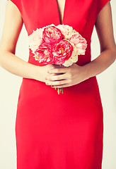 Image showing woman hands with bouquet of flowers