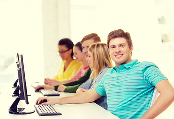 Image showing male student with classmates in computer class