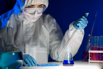 Image showing close up of scientist making test in lab