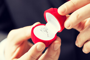 Image showing man with wedding ring and gift box