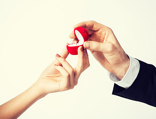 Image showing couple with wedding ring and gift box