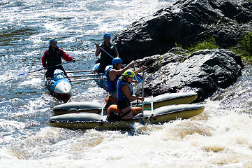 Image showing Water sportsmen in threshold