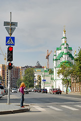 Image showing Girl crosses Street against Church of the Saviour