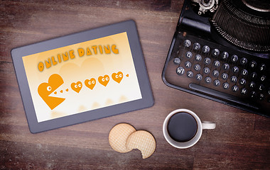 Image showing Online dating on a tablet