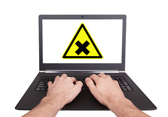 Image showing Man working on laptop, irritation