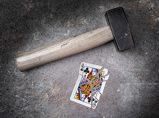 Image showing Hammer with a broken card, queen of clubs