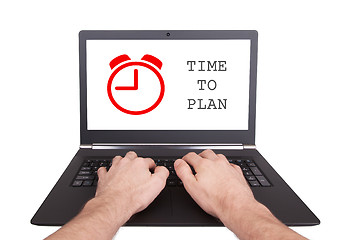 Image showing Man working on laptop, time to plan