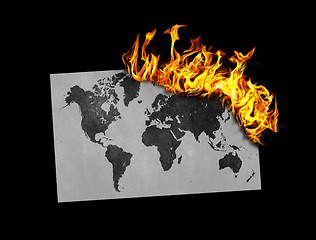 Image showing Flag burning - world map