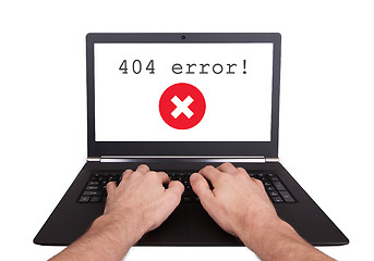 Image showing Man working on laptop, 404 error