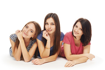 Image showing Girls friends lying smiling on floor