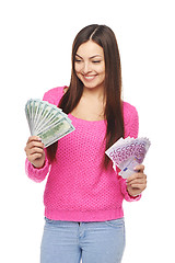 Image showing Casual woman with us dollars and euro cash