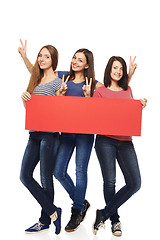 Image showing Three girl friends with red banner