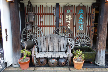 Image showing Chairs and tables outside the shop