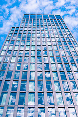 Image showing Skyscraper with sky reflection