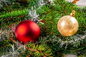 Image showing Christmas baubles on pine