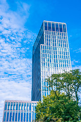 Image showing Skyscraper surrounded by nature