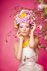 Image showing Fresh skin Girl with Spring Flowers on her head