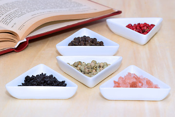 Image showing Variety of peppercorns and salt