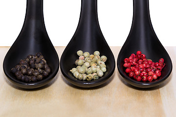 Image showing Three types of peppercorns