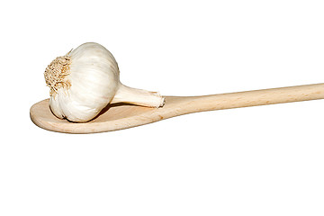 Image showing Garlic on a light wooden spoon