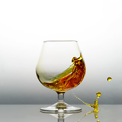Image showing Splashing cognac