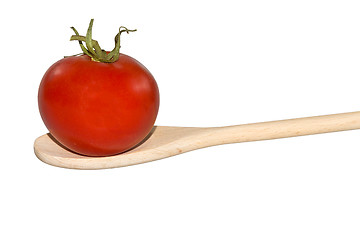 Image showing Tomato on a light wooden spoon