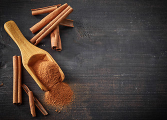 Image showing Cinnamon sticks and powder