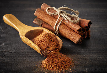 Image showing Cinnamon sticks and powder