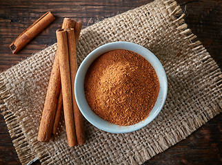 Image showing Cinnamon sticks and powder