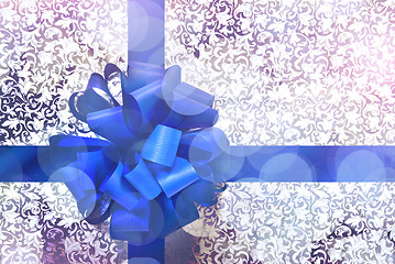 Image showing Gift with blue bow and ribbon