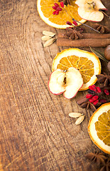 Image showing Christmas spices and dried orange sliceson 