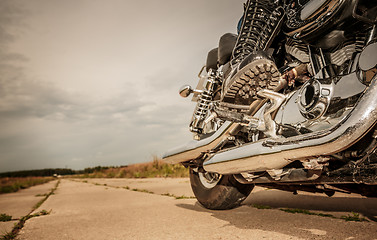 Image showing Biker girl riding on a motorcycle