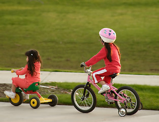 Image showing Family Sisters Bicycle Riding