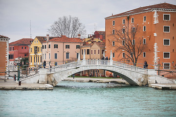 Image showing Tourists crossing water canal in Venice