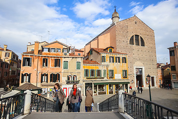 Image showing Tourists walking over bridge in Venice