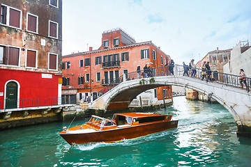 Image showing Ship sailing under bridge in Venice